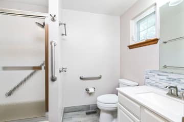 Upper level Full Bathroom: Sink ~ Toilet ~ Shower/Tub ~ Storage Cabinet