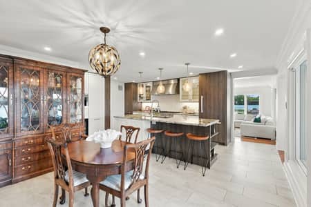 Chef kitchen with island range and pendant lighting at 3 Willowbank Avenue