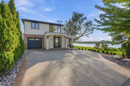 Front driveway and garage at 3 Willowbank Avenue Richmond Hill