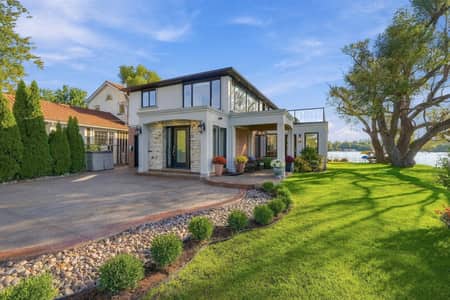 Front exterior of 3 Willowbank Avenue with landscaped approach