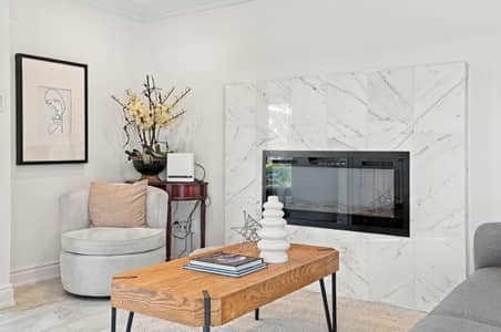 Statement fireplace and lounge area at 3 Willowbank Avenue